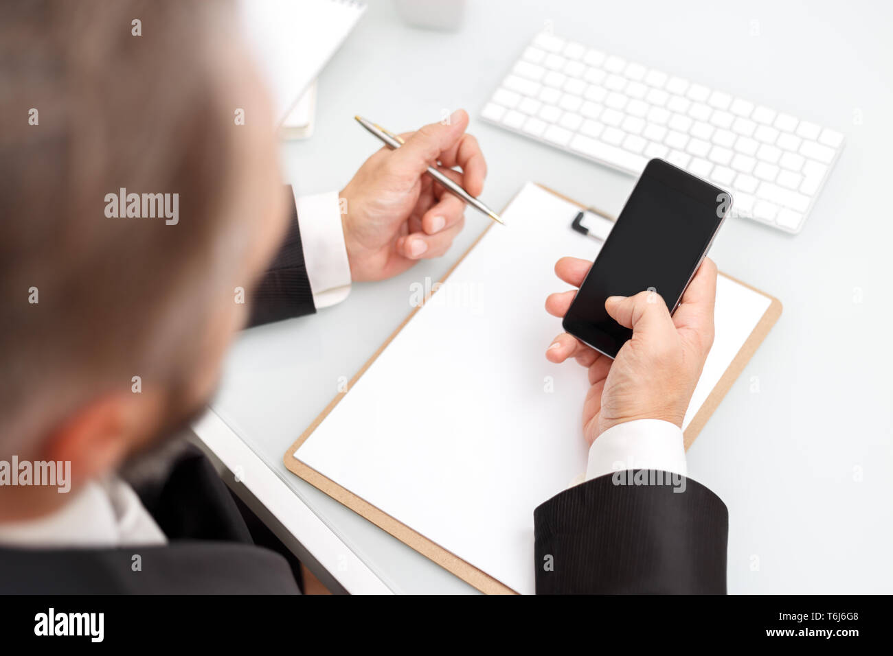 Male using smartphone Stock Photo