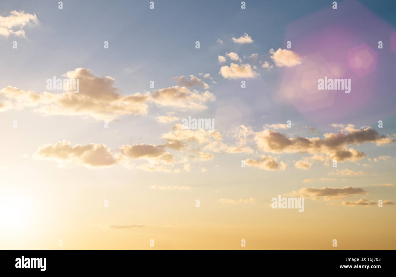 Sunset sky in summer (with flares ver Stock Photo - Alamy