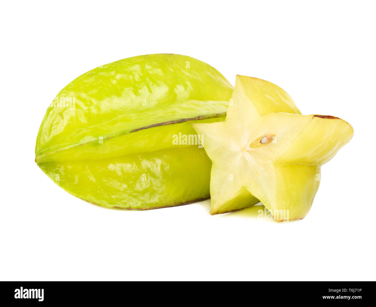 Ripe carambola fruit with half on white background Stock Photo