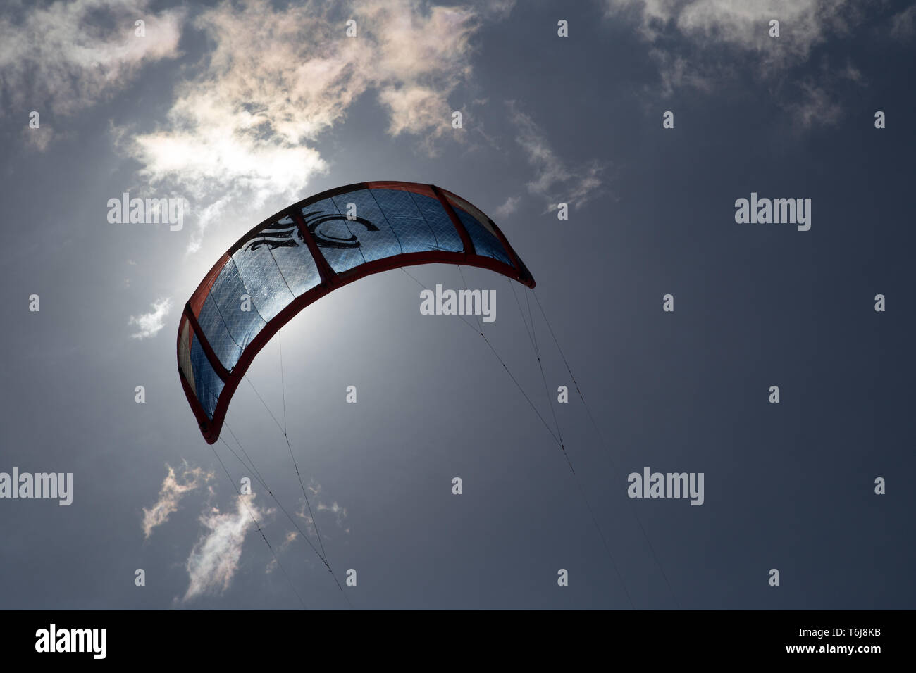 Silhouette of a Parachute Stock Photo