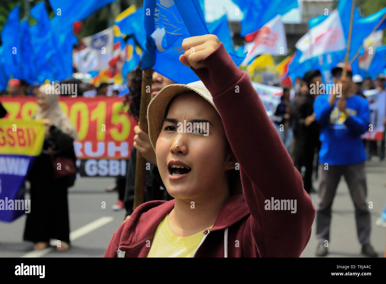 A workers seen shouting slogans during the rally. Thousands of workers are urging the government to raise minimum wages and to improve working conditions. Stock Photo