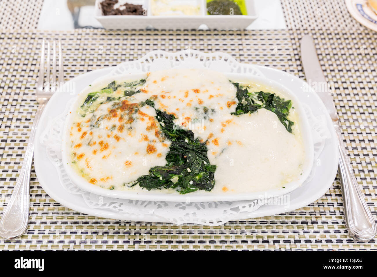 Baked spinach with cheese Stock Photo