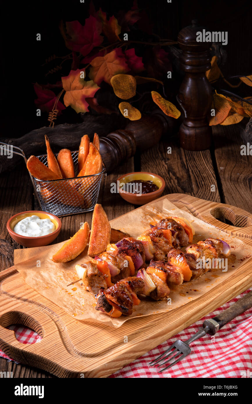 sweet potato fries with spicy paprika shashlik Stock Photo Alamy