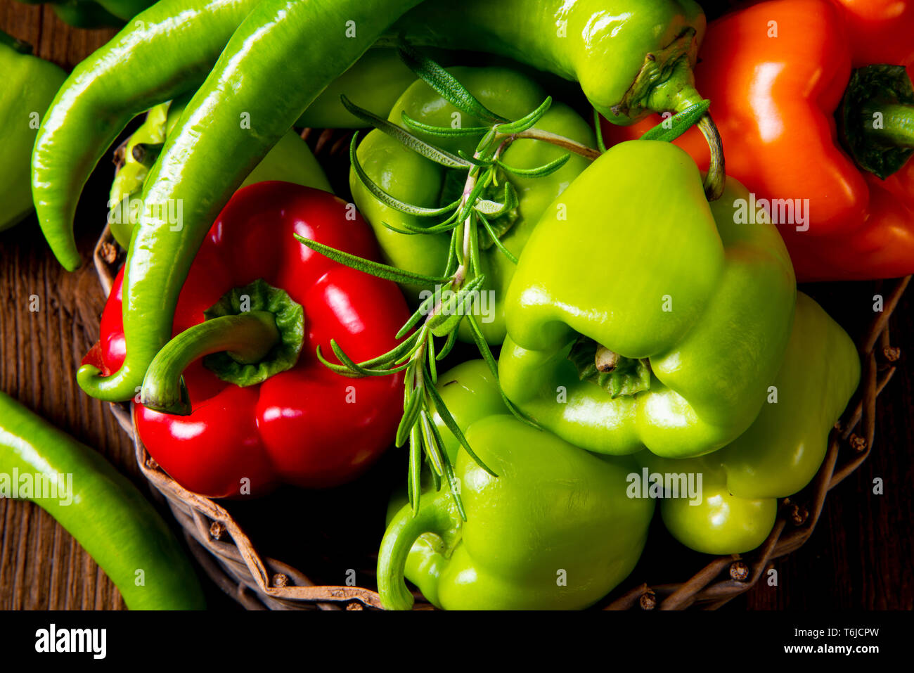 various harvested peppers and hot peppers in basket Stock Photo - Alamy