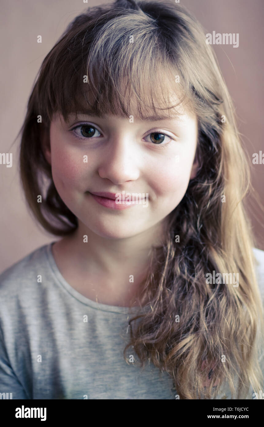 Portrait of little pretty girl with cute smile. Beautiful girl