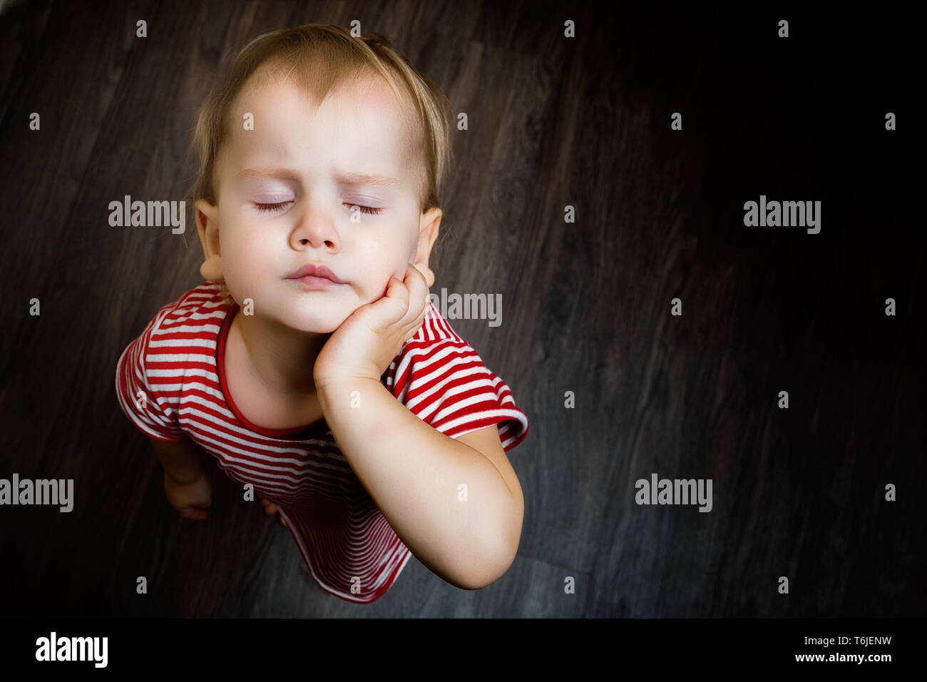 children's toothache, poor health of the child, toothache, caries, dentistry Stock Photo