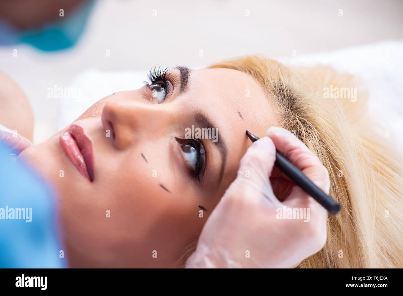 Injection rhinoplasty. Woman getting cosmetic injection of botulinum to  nose Stock Photo - Alamy