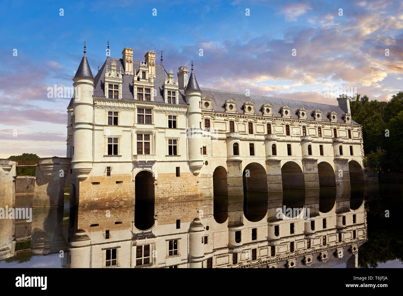 French Chateau de Chenonceau  spanning the River Cher in the the Loire Valley at sunset, Indre-et-Loire département, France Stock Photo