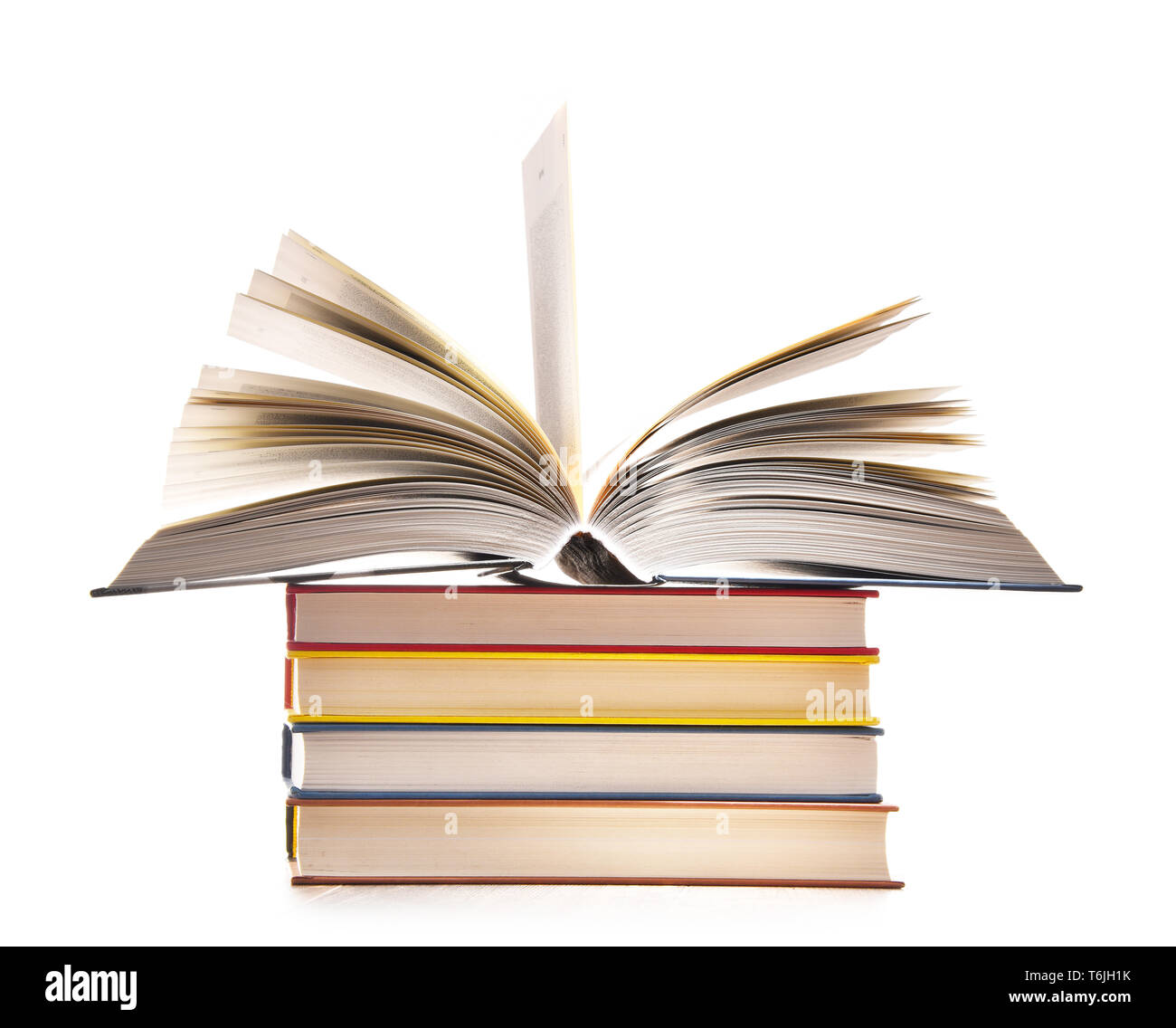 Composition with stack of books isolated on white. Stock Photo
