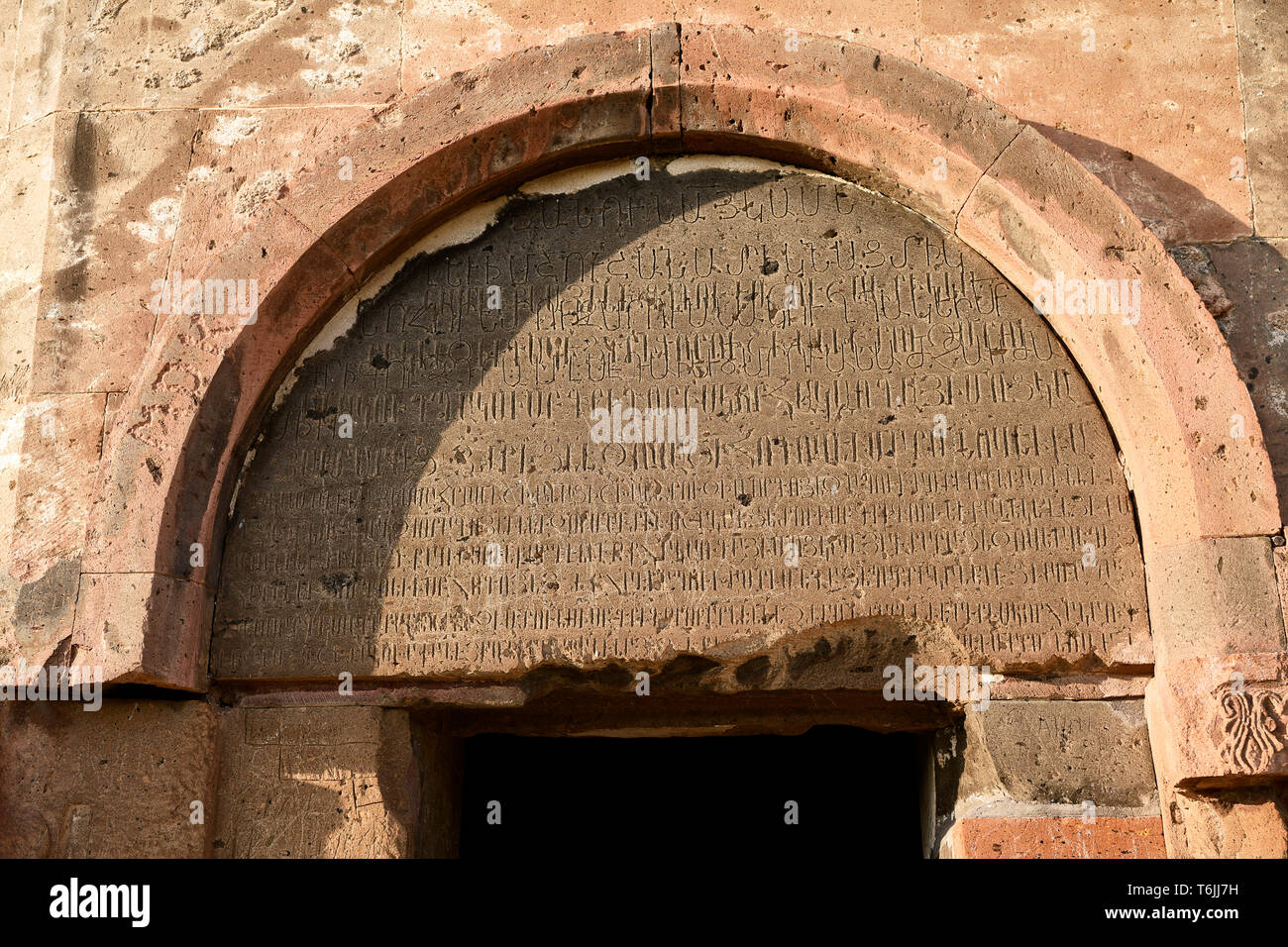 Armenian script over thr door of the cathedral of Ani, Also known as Surp Asdvadzadzin (church of the Holy Mother of God), its construction was starte Stock Photo