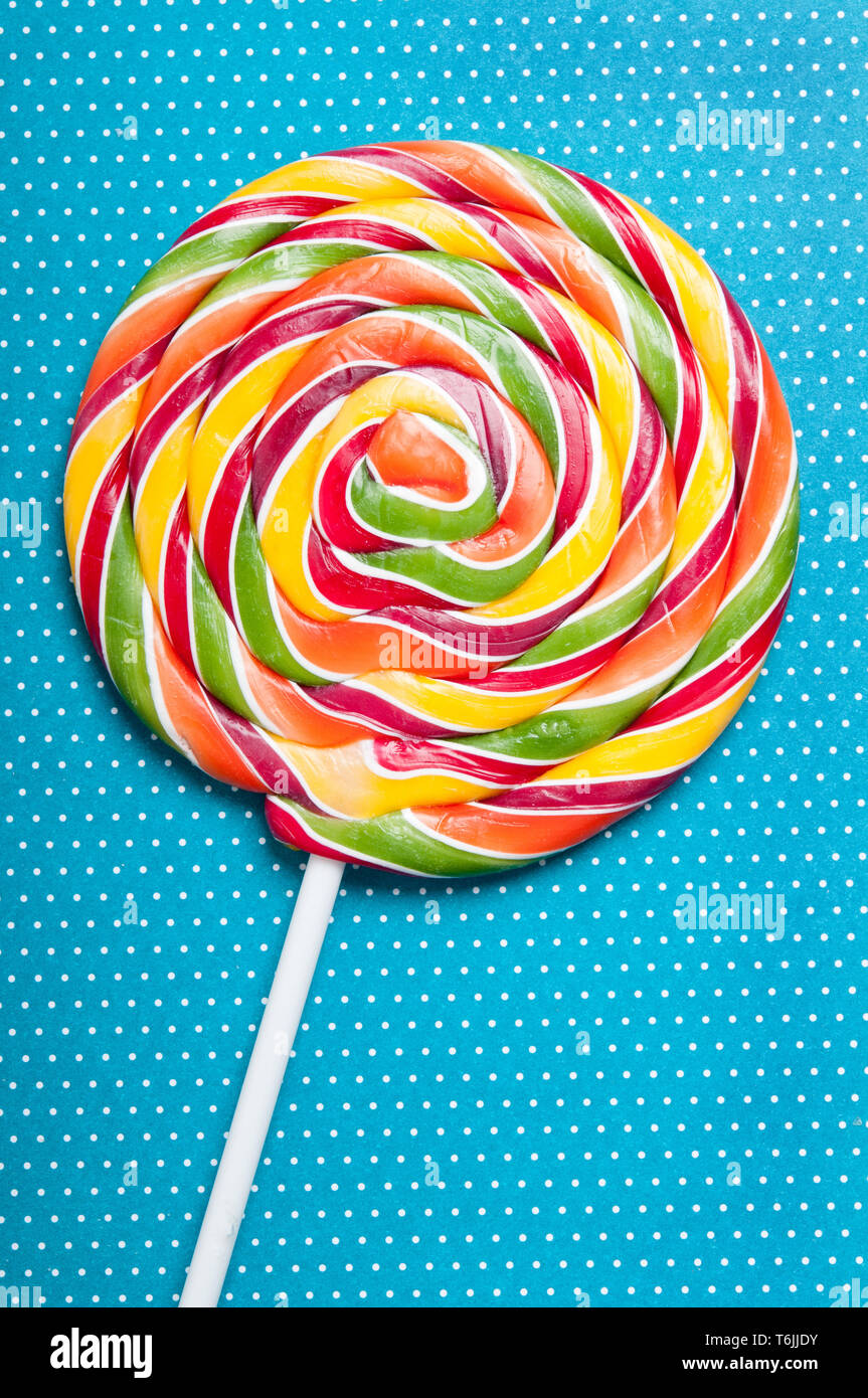 colorful lollipop on a blue background Stock Photo
