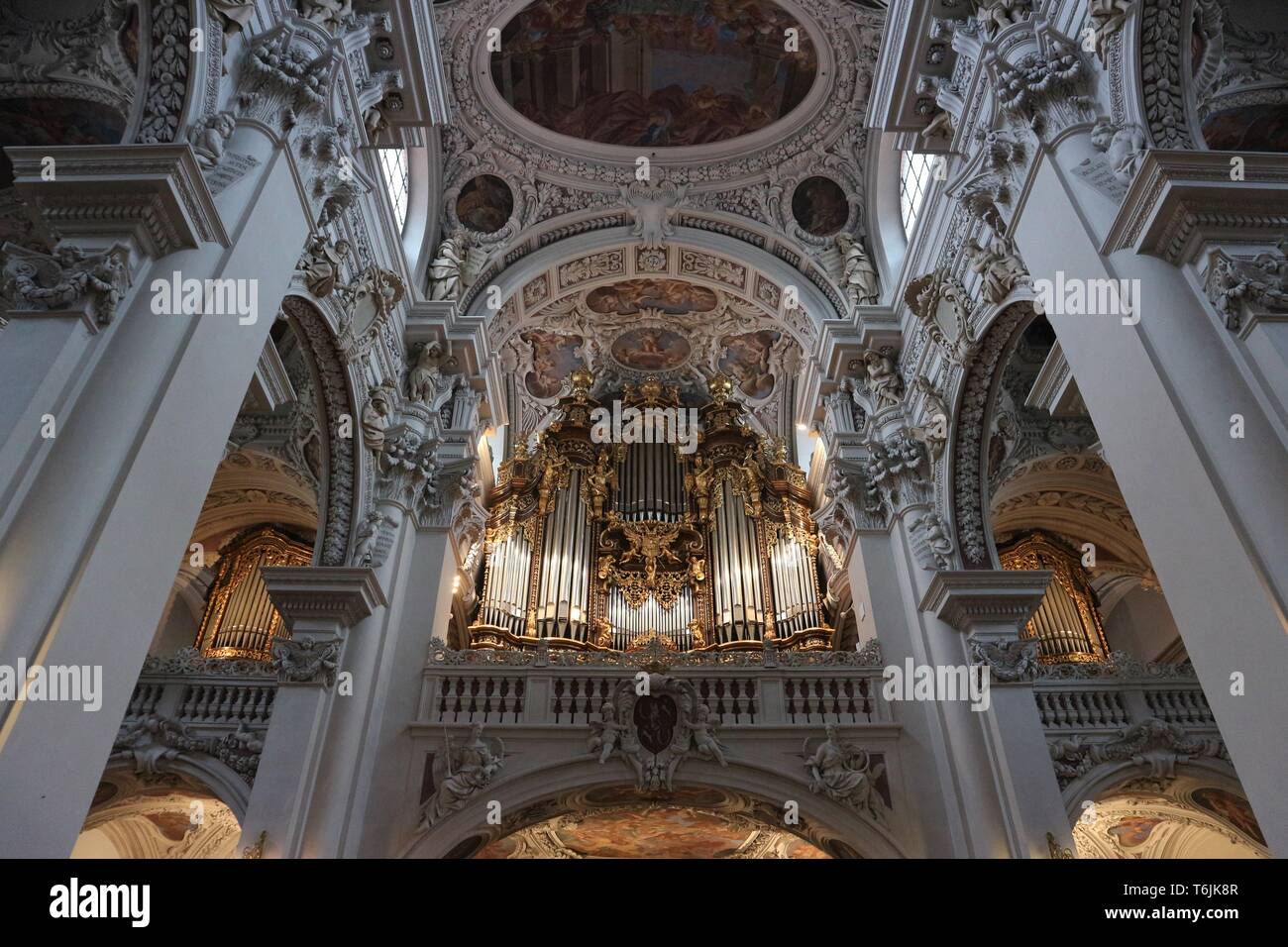 The world's famous organ in the dome of Passau, Germany photographed in a low-angle shot. Stock Photo