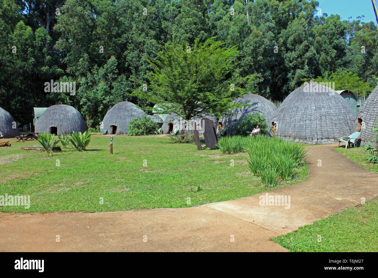 Traditional houses in Swaziland as accommodation in a national park Stock Photo