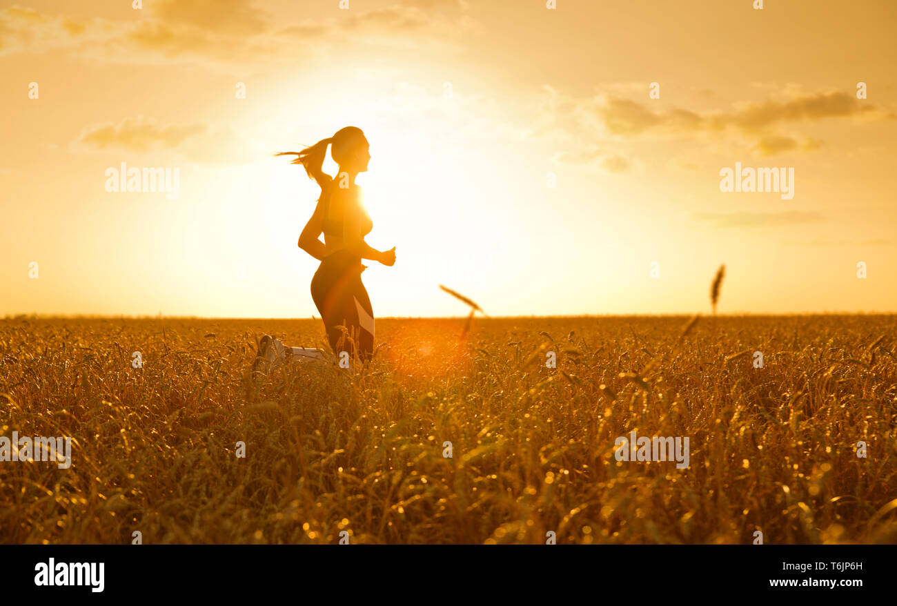 Woman alone in the field hi-res stock photography and images - Alamy