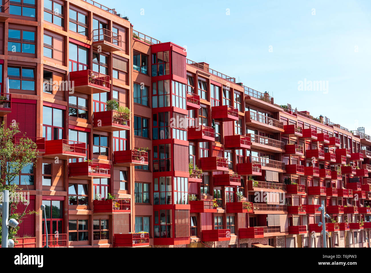 Modern red apartment building seen in Berlin, Germany Stock Photo Alamy