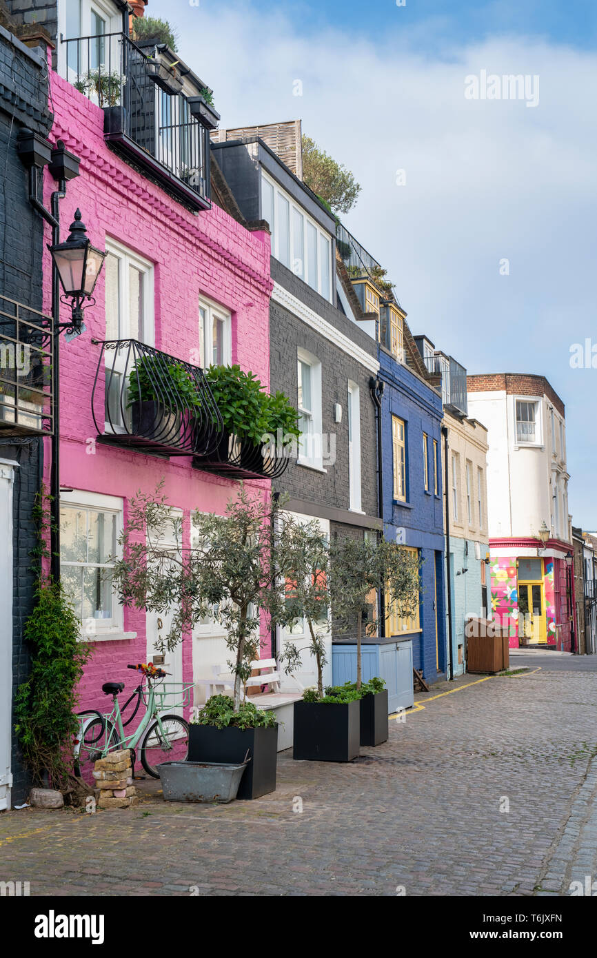 Pink painted house in St Lukes mews, Notting Hill, West London, England Stock Photo