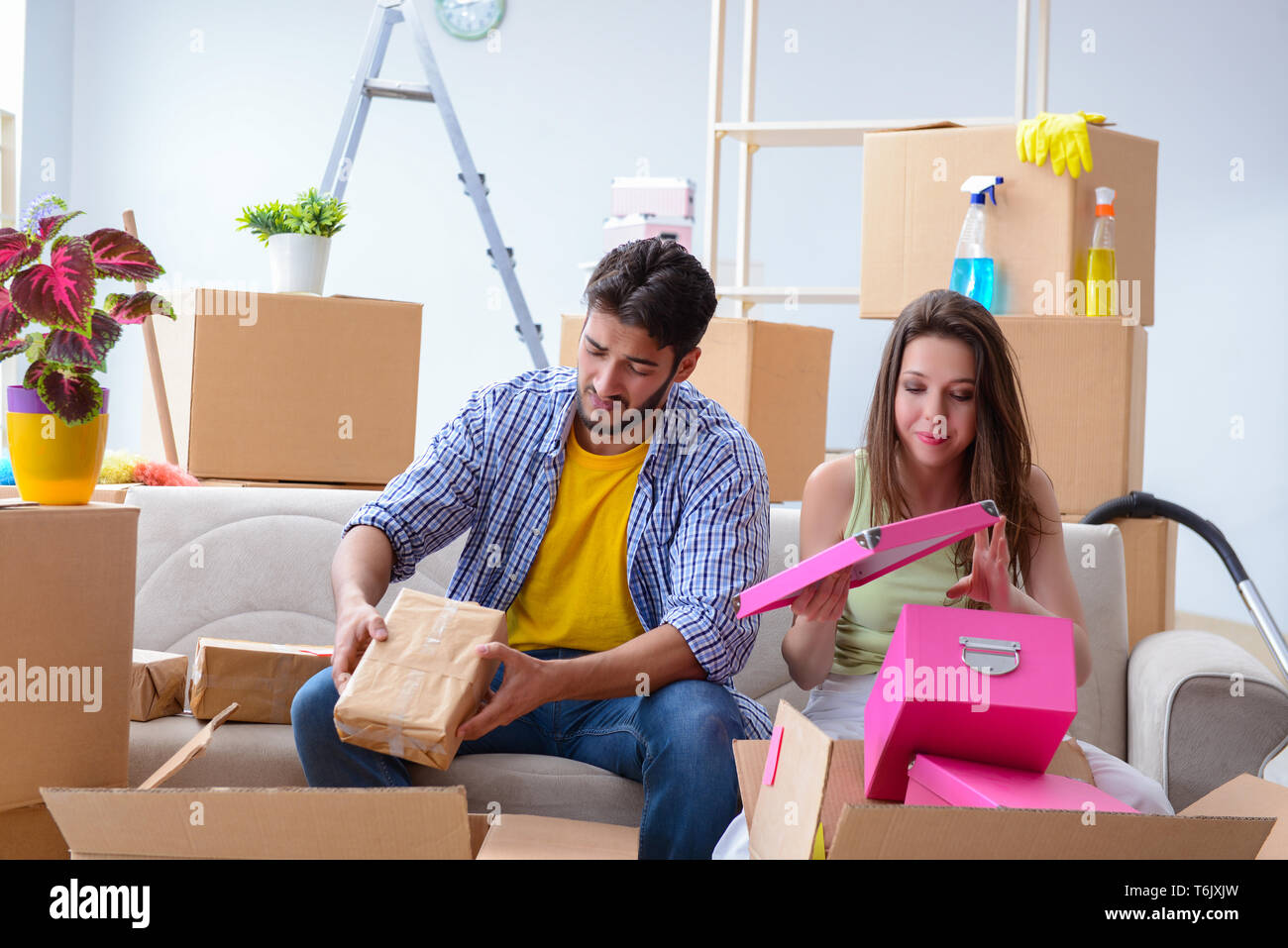 The family preparing for christmas after relocation Stock Photo - Alamy