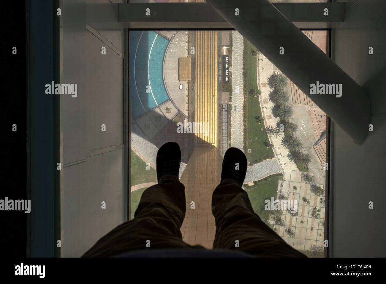 Standing on the glass walkway on The Dubai Frame new tourist attraction in Dubai, UAE Stock Photo