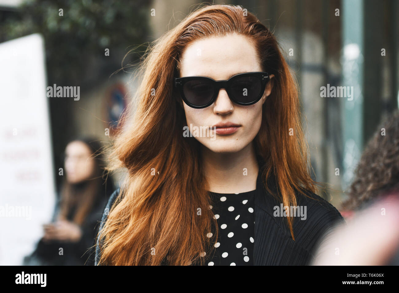 Milan, Italy - February 20, 2019: Street style outfit after a fashion show during Milan Fashion Week - MFWFW19 Stock Photo