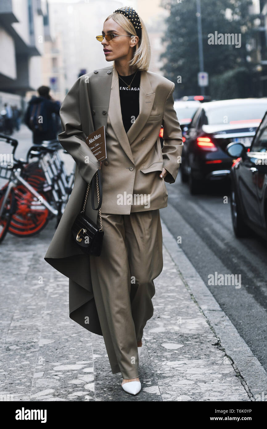 Milan, Italy - February 21, 2019: Street style – Woman wearing Balenciaga  after a fashion show during Milan Fashion Week - MFWFW19 Stock Photo - Alamy