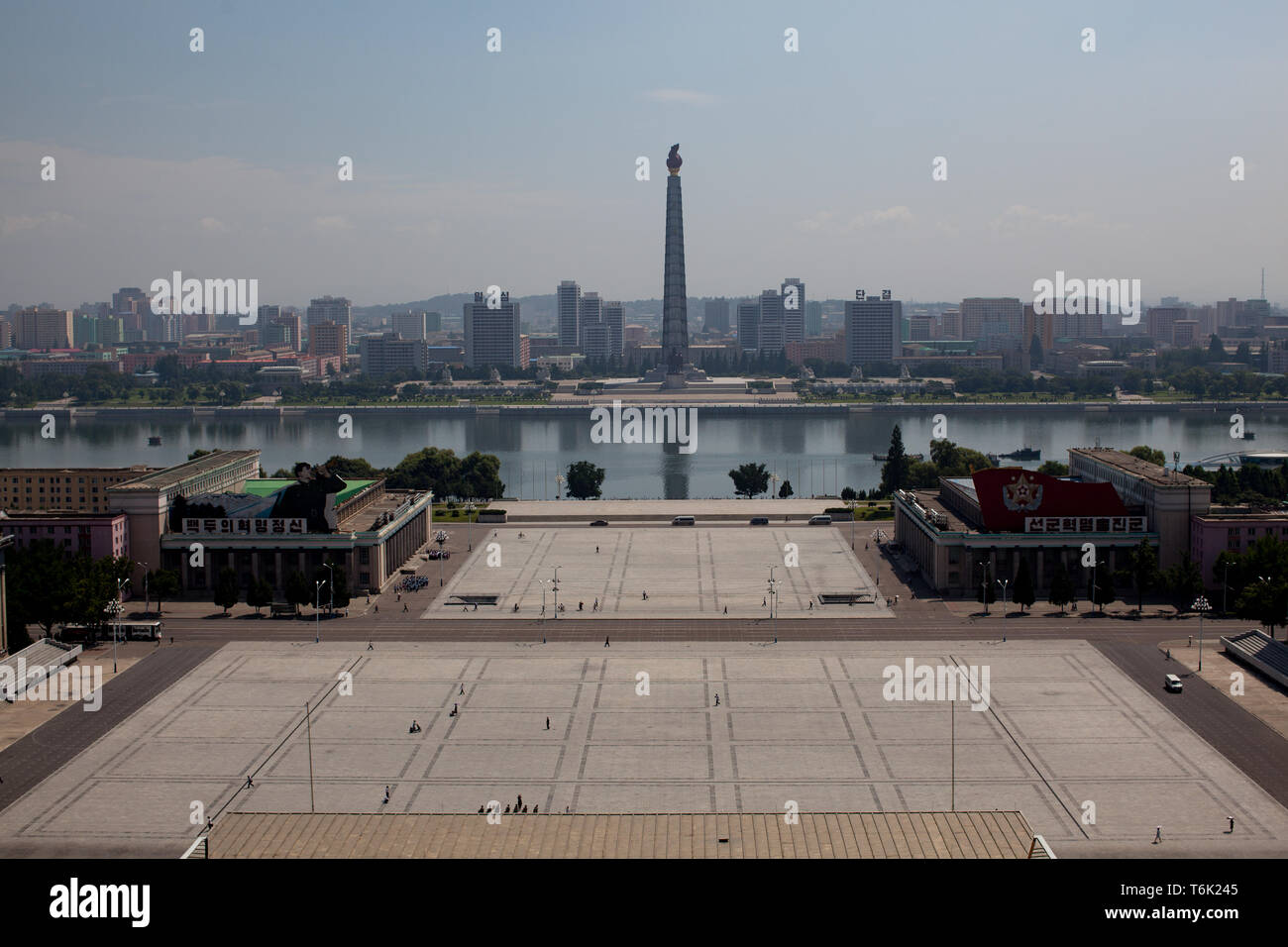 The Juche Idea Tower is seen across the Taedong River beyond Kim Il Sung Square in Pyongyang. Stock Photo