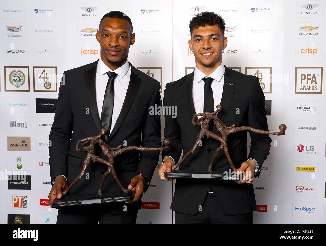 Mansfield Town's Krystian Pearce (left) and Tyler Walker during the 2019 PFA Awards at the Grosvenor House Hotel, London. Stock Photo