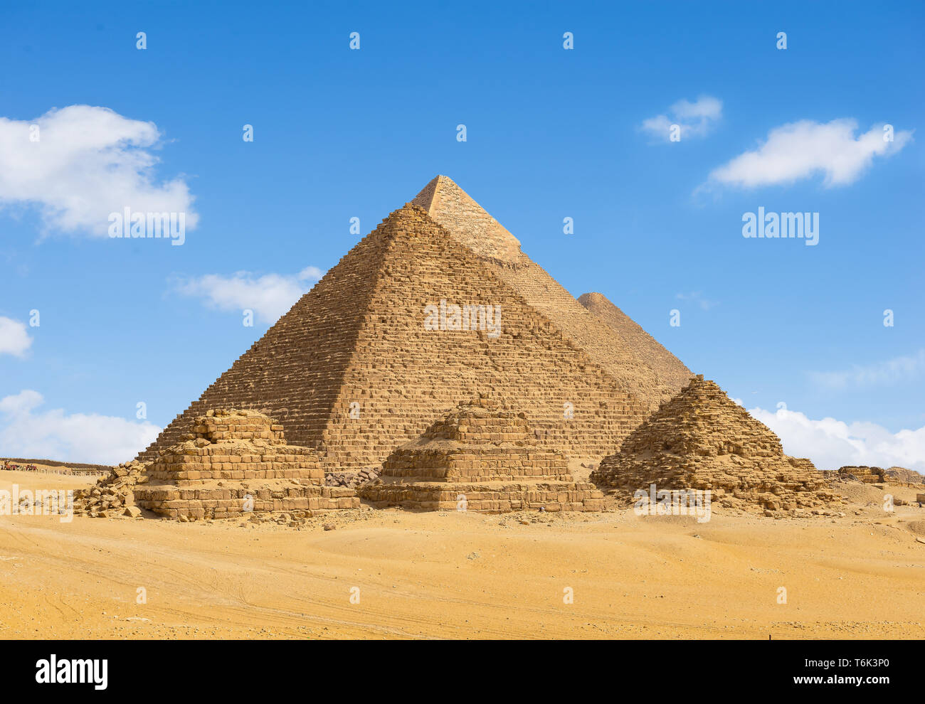 Egyptian pyramids in desert of Giza in a row Stock Photo - Alamy