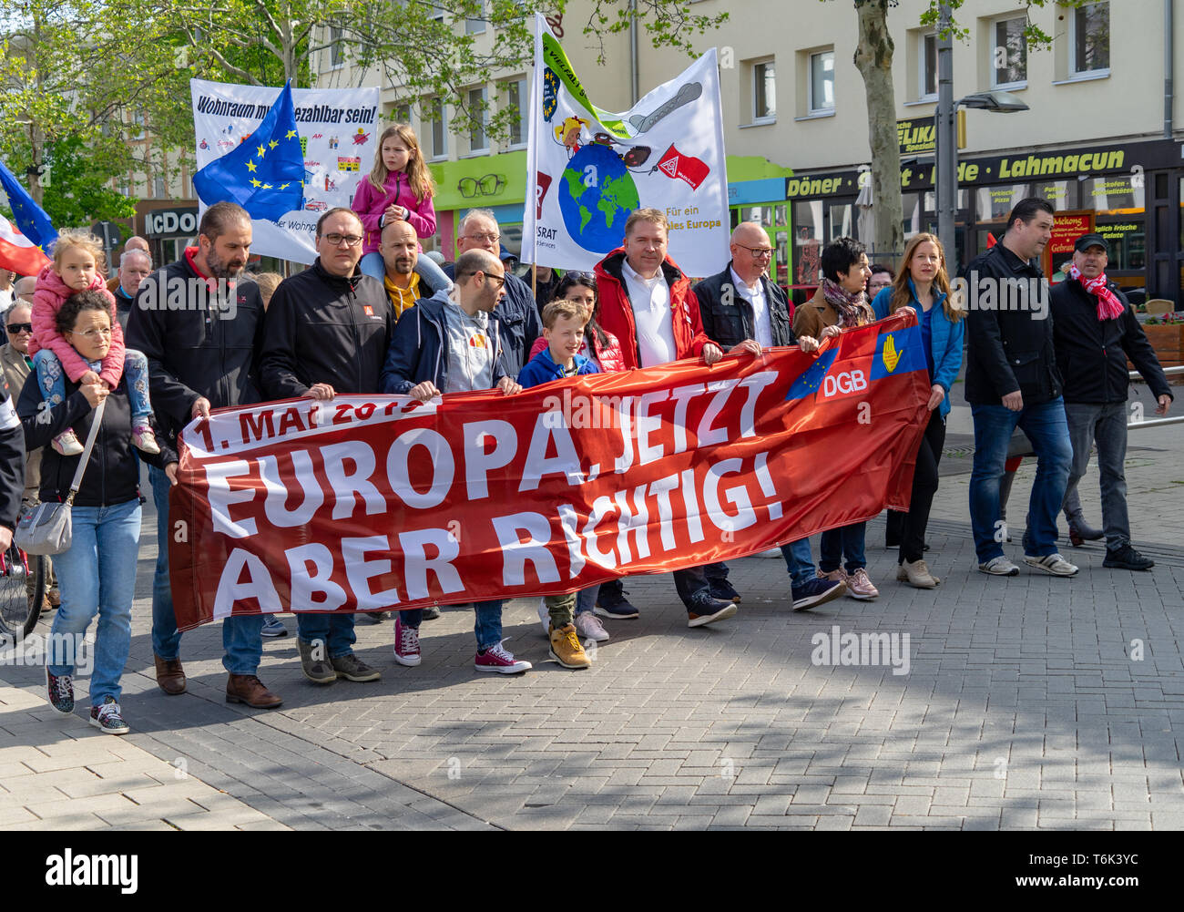 Wolfsburg, Germany, May 1, 2019: Demonstrators at the May 1 demonstration carry a banner with the inscription "Europe, but now properly" in front of t Stock Photo