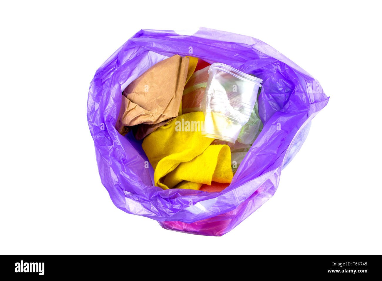 Concept of garbage and pollution. A pile of trash, crumpled plastic cup ...