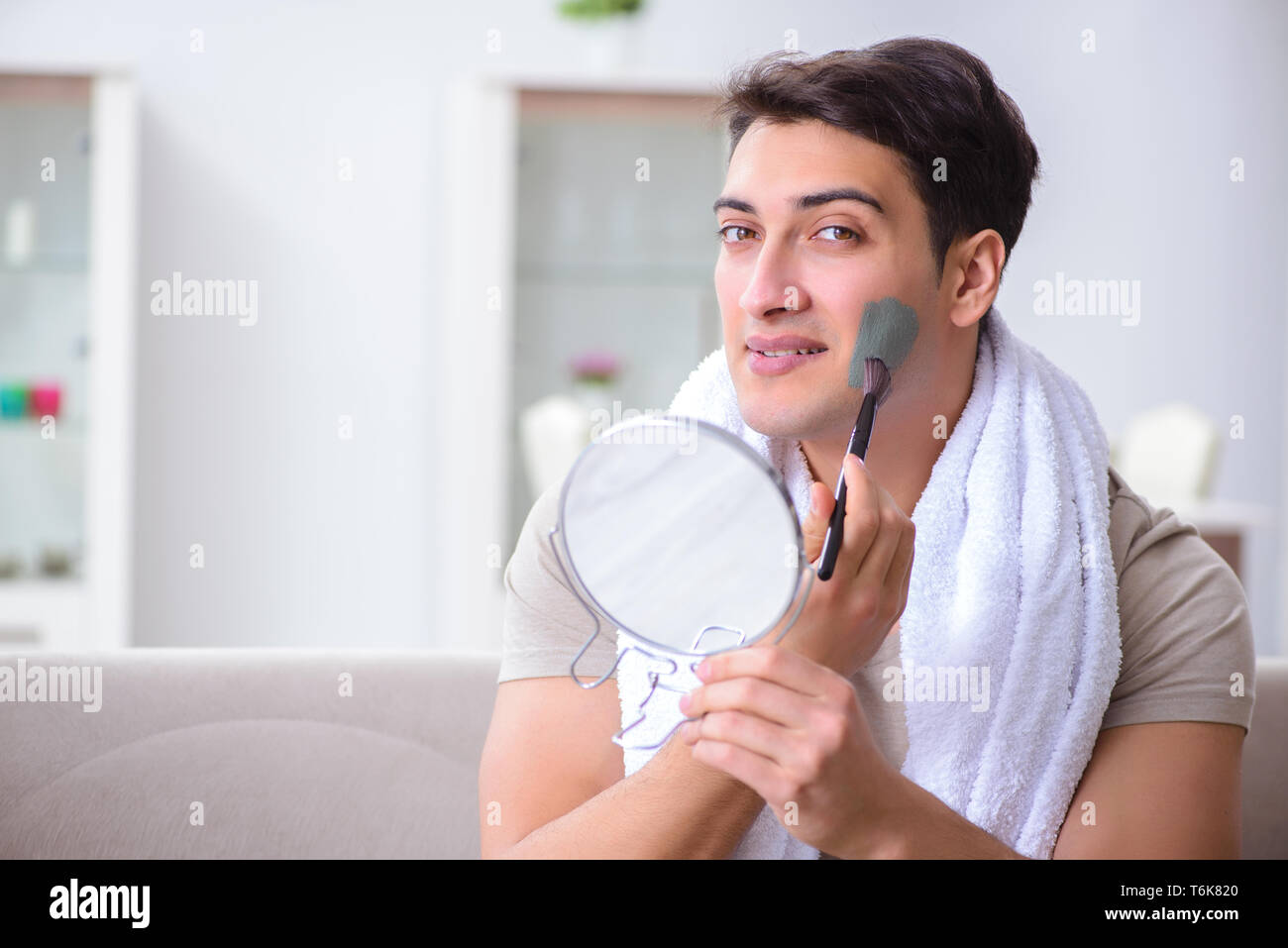 Man peeling off mask hi-res stock photography and images - Alamy