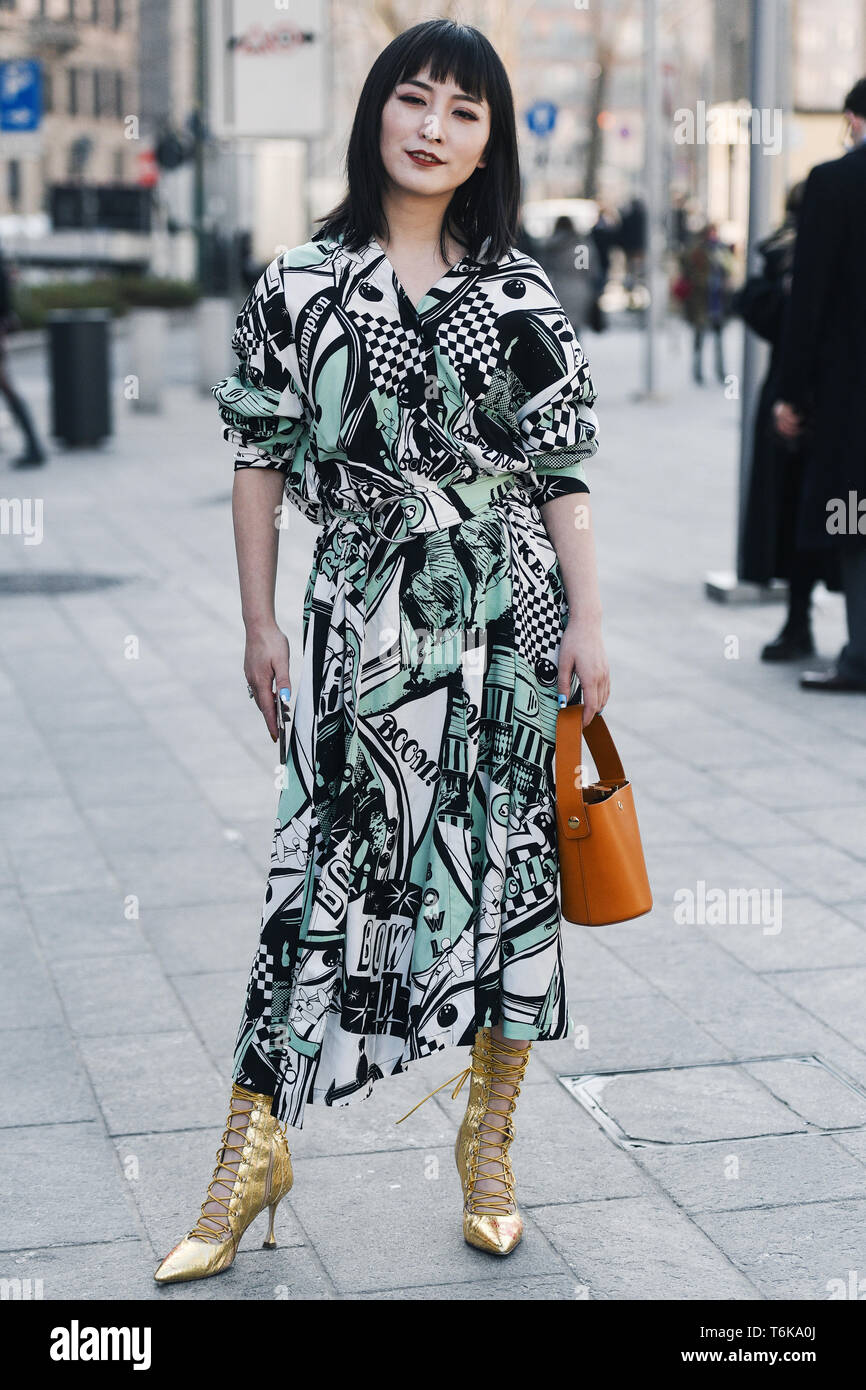 Milan, Italy - February 20, 2019: Street style outfit before a fashion show  during Milan Fashion Week - MFWFW19 Stock Photo - Alamy