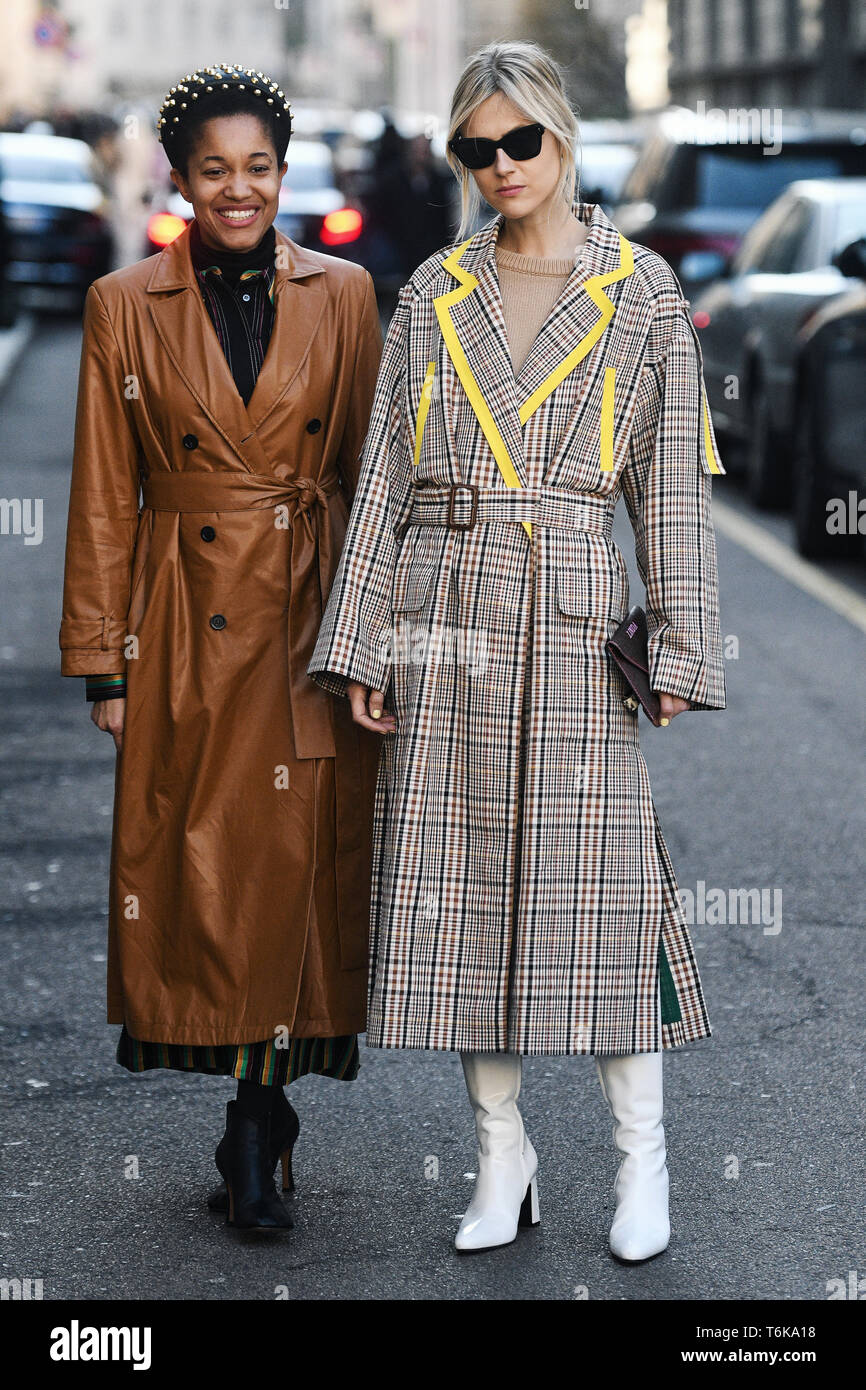 Milan, Italy - February 22, 2019: Street style – Influencers Tamu McPherson and Linda Tol after Stock Photo