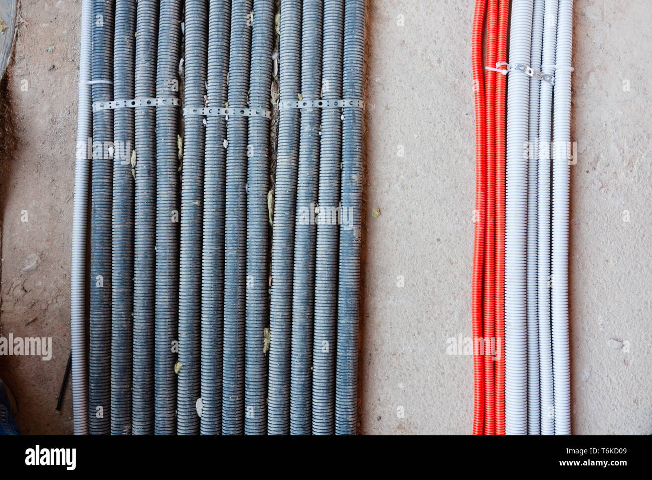 Laying of electricity cables, networks, heating. Corrugated lines on