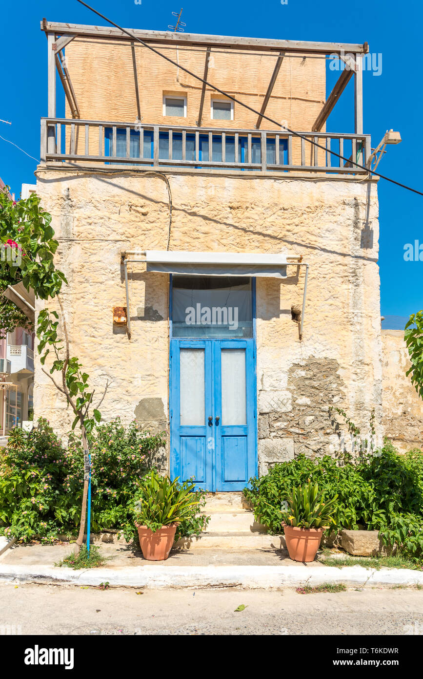 Blue front door of an old stylish house in Paleochora Stock Photo