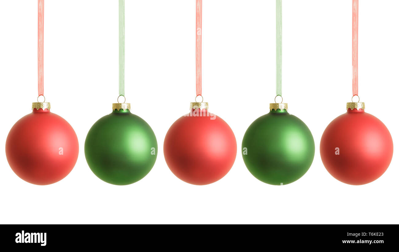 Hanging christmas baubles isolated on white background. Stock Photo