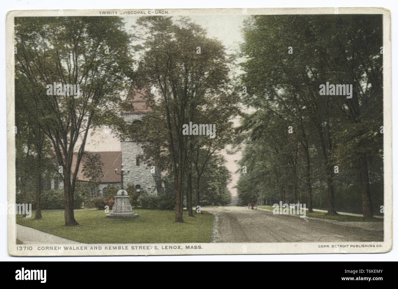 Detroit Publishing Company vintage postcard depicting the Trinity Episcopal Church at the shady corner of Walker and Kemble Streets in Lenox, Massachusetts, 1914. From the New York Public Library. () Stock Photo