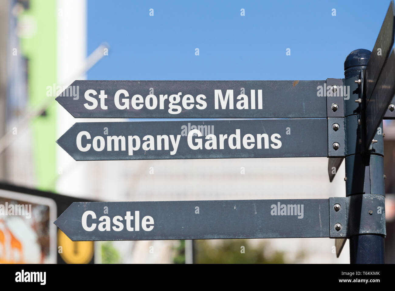 Directions board with arrow markers to tourist attractions or