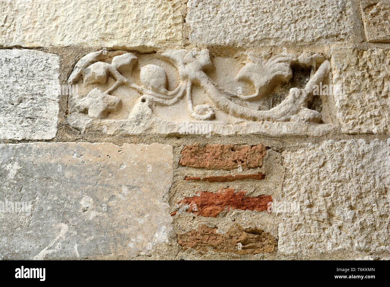 Ancient carving on a wall at the Archaeological park of Apollonia Greek city ruins Albania Stock Photo