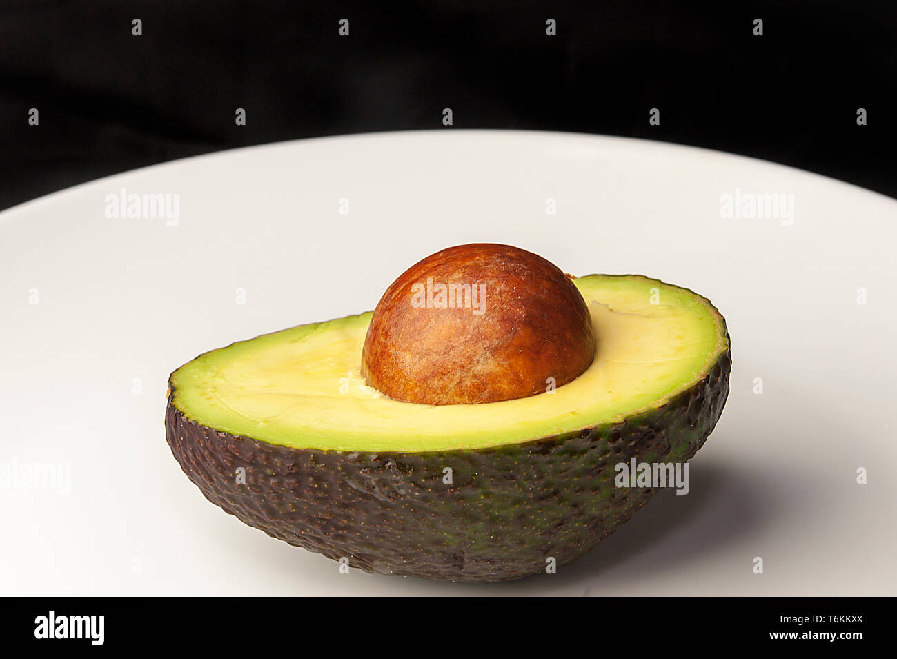 Fresh green avocado low glycemic index good for diabetes Stock