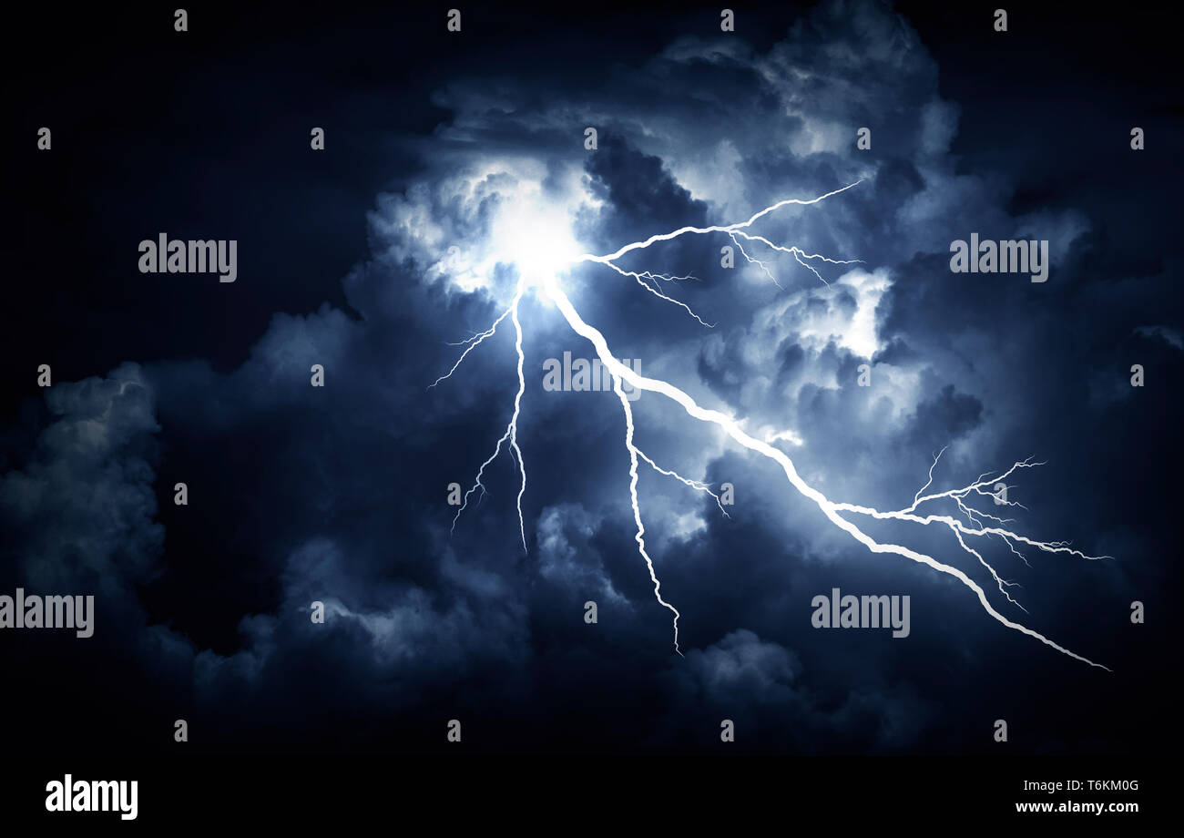 Lightning strike on the dark cloudy sky Stock Photo - Alamy