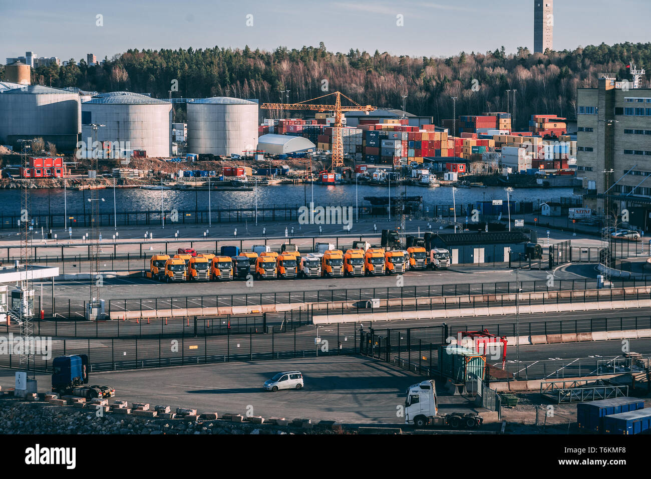 Editorial 03.29.2019 Stockholm Sweden. Scania trucks in Frihamnen waiting for transport to costumers on a spring evening Stock Photo