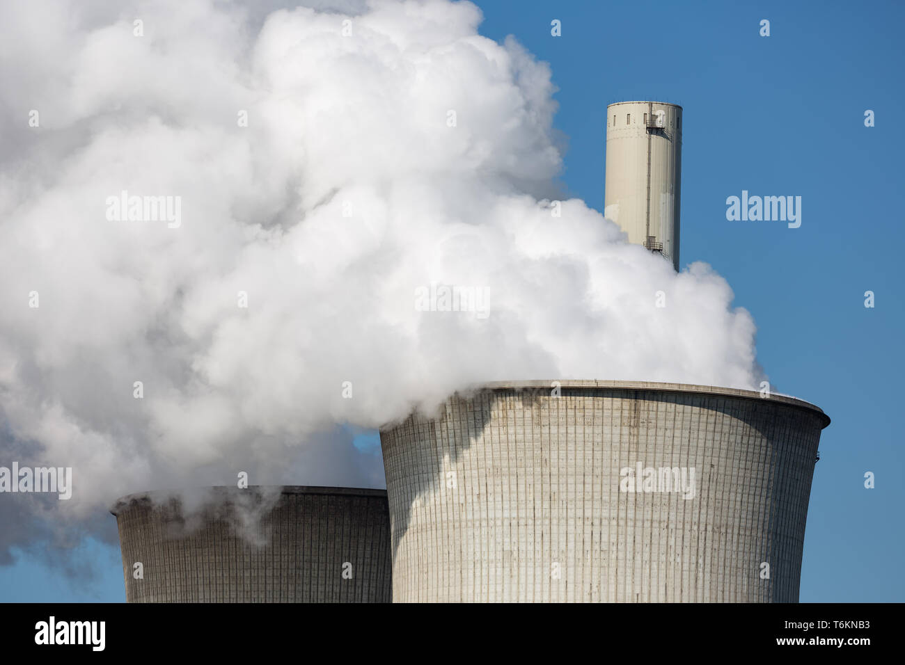 Cooling towers and smokestacks coal fired power plant in Germany Stock Photo