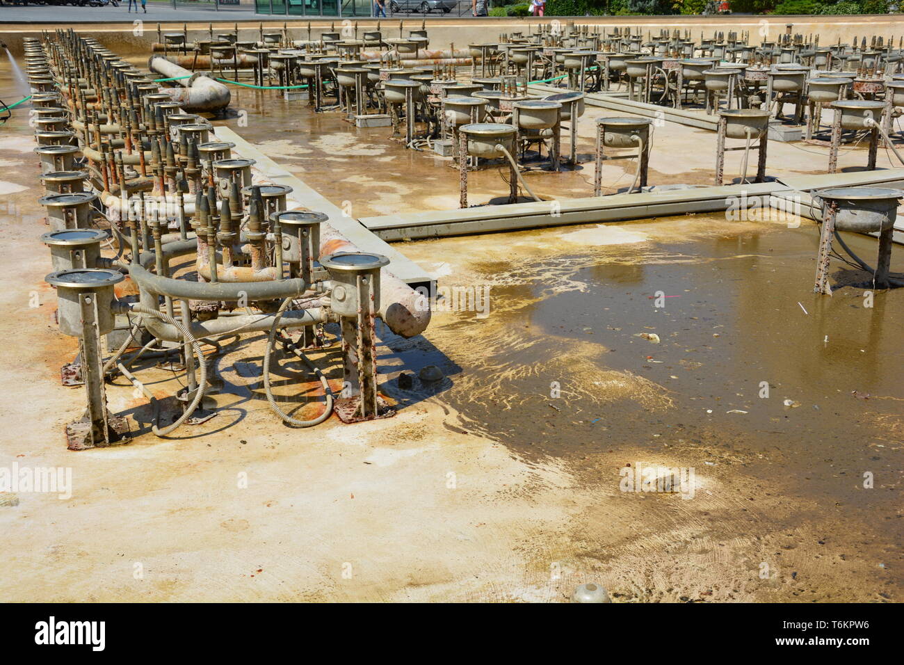 an empty fountain, floodlights and piping Stock Photo - Alamy