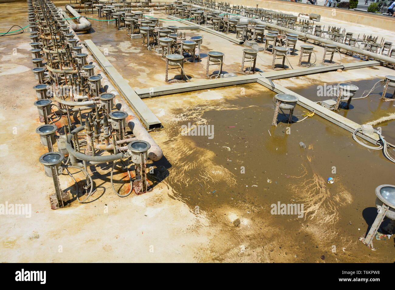 an empty fountain, floodlights and piping Stock Photo - Alamy
