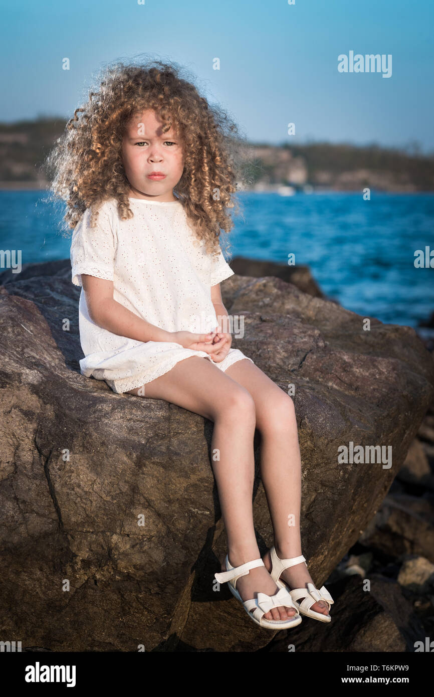 Little girl in white dress Stock Photo Alamy