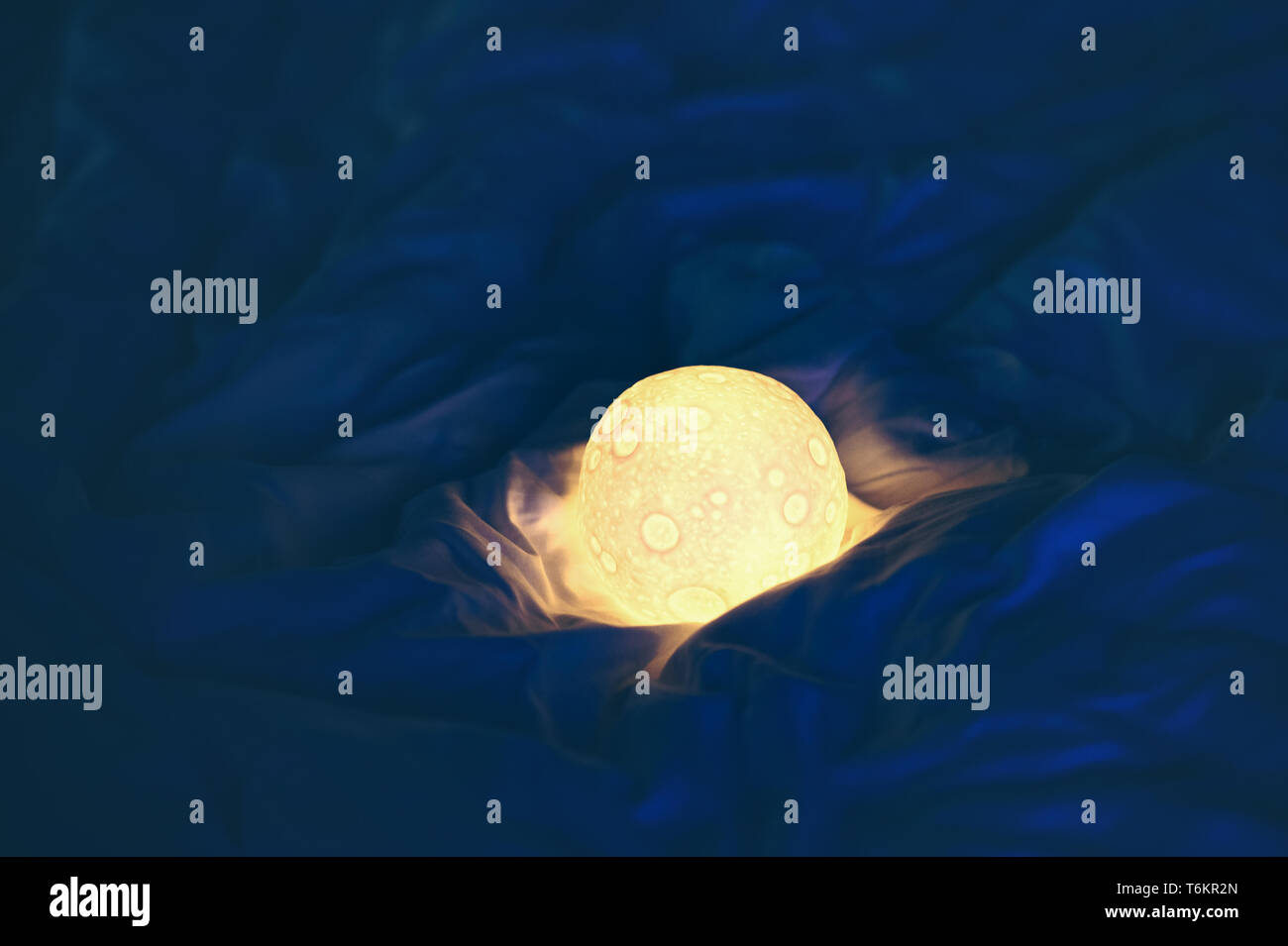decorative moon lamp in bed Stock Photo Alamy