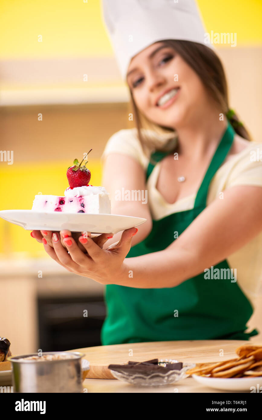 Chef Cook Cake Confectioner in kitchen making strawberry hi-res stock photography and ...