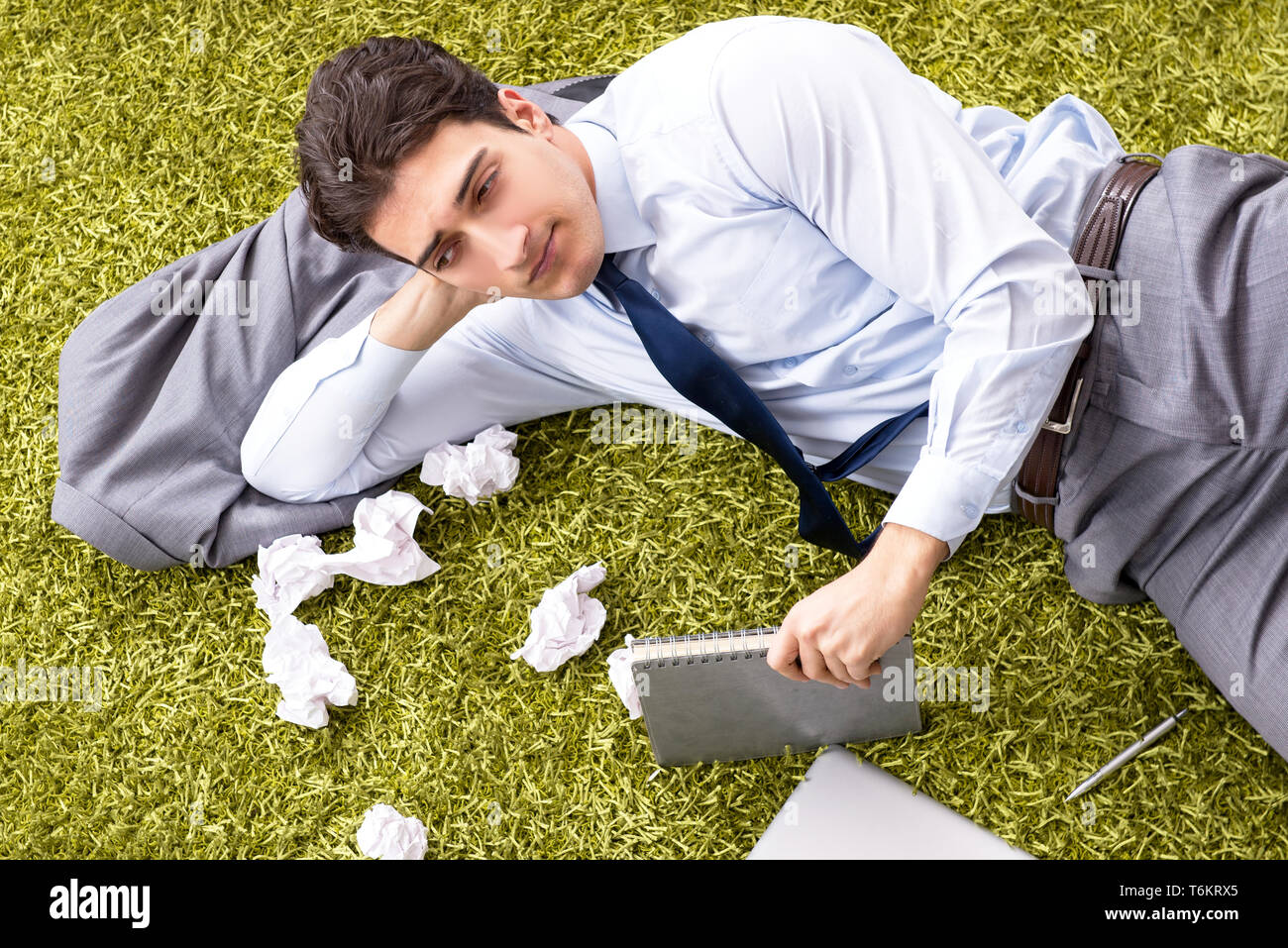 Young handsome man working under startup project at home Stock Photo ...