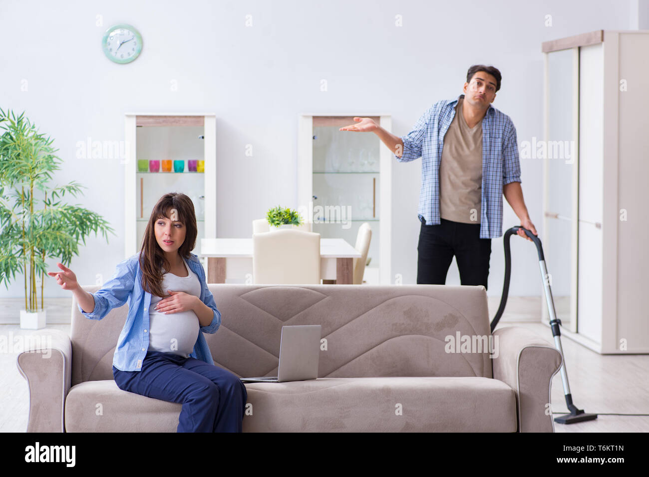 Man frustrated woman cleaning hires stock photography and images Alamy