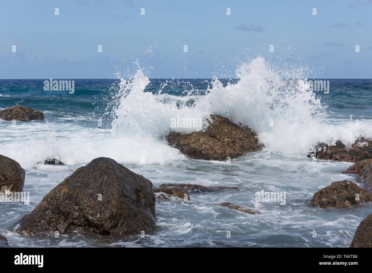 Breaking waves at rocky coast of Madeira Island Stock Photo - Alamy